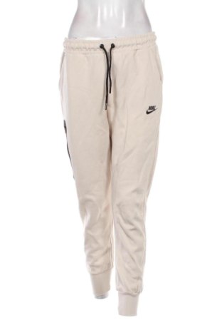 Dámske tepláky Nike, Veľkosť L, Farba Béžová, Cena  24,95 €