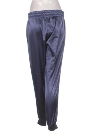 Damskie spodnie sportowe Nike, Rozmiar S, Kolor Fioletowy, Cena 110,99 zł