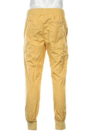 Herren Jeans Tommy Jeans, Größe M, Farbe Gelb, Preis € 50,99