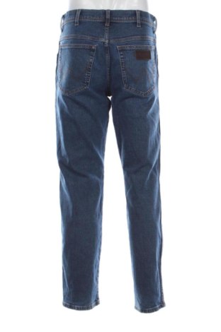 Męskie jeansy Wrangler, Rozmiar M, Kolor Niebieski, Cena 203,62 zł