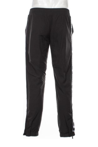 Ανδρικό παντελόνι Karl Kani, Μέγεθος M, Χρώμα Μαύρο, Τιμή 23,99 €