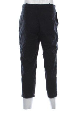 Męskie spodnie Uniqlo, Rozmiar M, Kolor Niebieski, Cena 351,35 zł