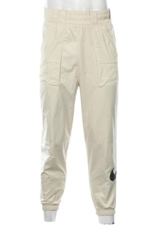 Pánské tepláky  Nike, Velikost S, Barva Béžová, Cena  729,00 Kč