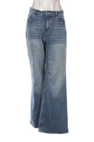 Damskie jeansy H&M, Rozmiar L, Kolor Niebieski, Cena 103,41 zł