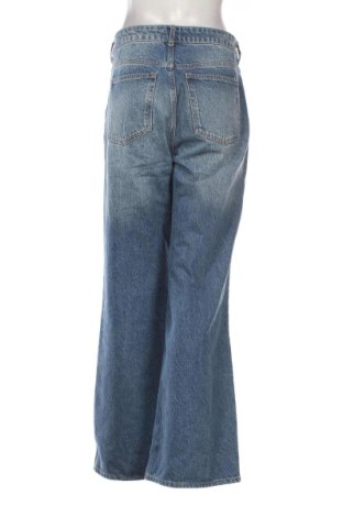 Damskie jeansy H&M, Rozmiar L, Kolor Niebieski, Cena 103,41 zł