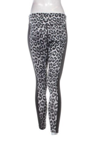 Damskie legginsy Nike, Rozmiar L, Kolor Kolorowy, Cena 114,40 zł