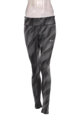 Damskie legginsy Nike, Rozmiar L, Kolor Kolorowy, Cena 110,99 zł