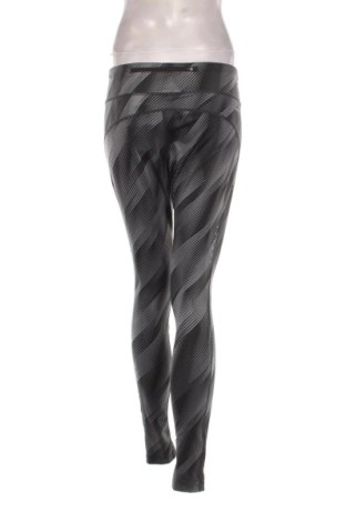 Damskie legginsy Nike, Rozmiar L, Kolor Kolorowy, Cena 110,99 zł
