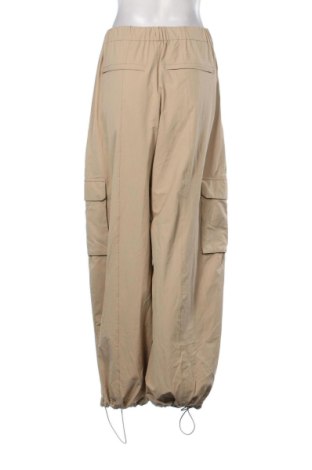 Damskie spodnie Oysho, Rozmiar L, Kolor Beżowy, Cena 112,53 zł