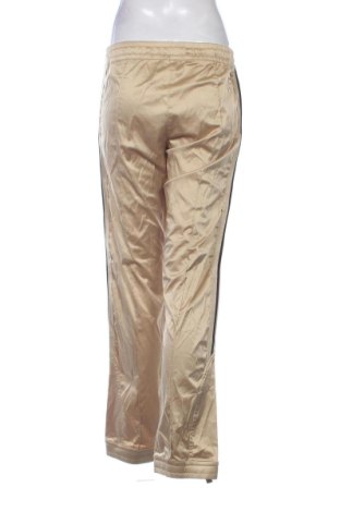 Damskie spodnie Unbranded, Rozmiar L, Kolor Złocisty, Cena 78,99 zł