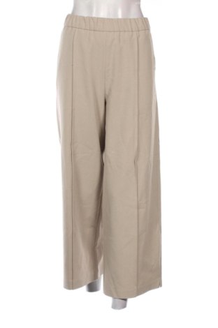 Damskie spodnie Zara, Rozmiar XL, Kolor Beżowy, Cena 74,00 zł