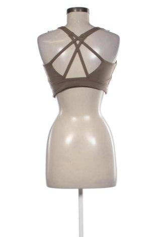 Damski sportowy top H&M, Rozmiar L, Kolor Beżowy, Cena 41,59 zł