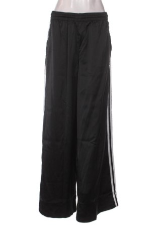 Damskie spodnie sportowe Adidas Originals, Rozmiar S, Kolor Kolorowy, Cena 250,99 zł