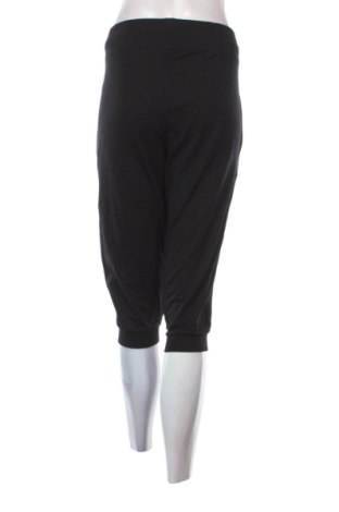 Damskie spodnie sportowe Crivit, Rozmiar XL, Kolor Czarny, Cena 78,99 zł