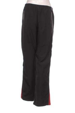 Дамско спортно долнище Erima, Размер L, Цвят Многоцветен, Цена 15,00 €