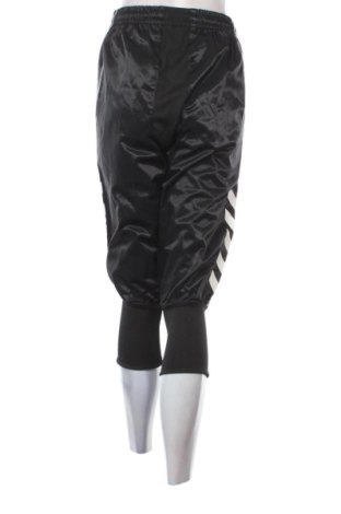 Damskie spodnie sportowe Hummel, Rozmiar M, Kolor Czarny, Cena 91,99 zł
