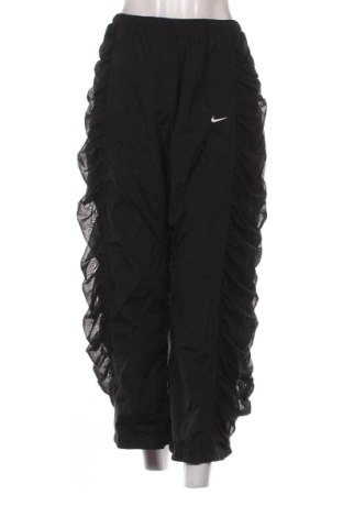 Damskie spodnie sportowe Nike, Rozmiar L, Kolor Czarny, Cena 250,99 zł