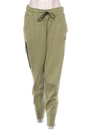 Damskie spodnie sportowe Nike, Rozmiar M, Kolor Zielony, Cena 174,74 zł