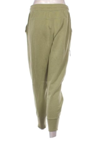 Damskie spodnie sportowe Nike, Rozmiar M, Kolor Zielony, Cena 174,74 zł