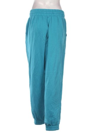 Damskie spodnie sportowe Tezenis, Rozmiar M, Kolor Niebieski, Cena 38,99 zł