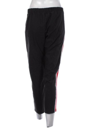 Damskie spodnie sportowe Tezenis, Rozmiar M, Kolor Czarny, Cena 78,99 zł