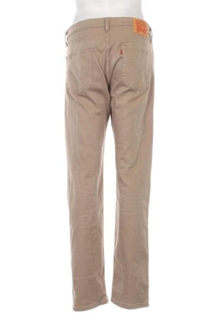 Męskie jeansy Levi's, Rozmiar L, Kolor Beżowy, Cena 201,99 zł