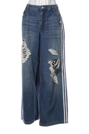 Damskie jeansy Adidas Originals, Rozmiar XL, Kolor Niebieski, Cena 471,55 zł