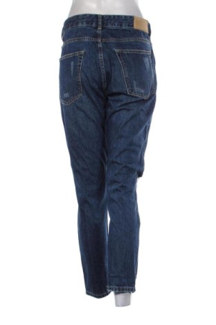 Damskie jeansy Calliope, Rozmiar XL, Kolor Niebieski, Cena 78,99 zł