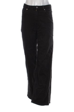 Damskie jeansy H&M Divided, Rozmiar M, Kolor Czarny, Cena 79,15 zł