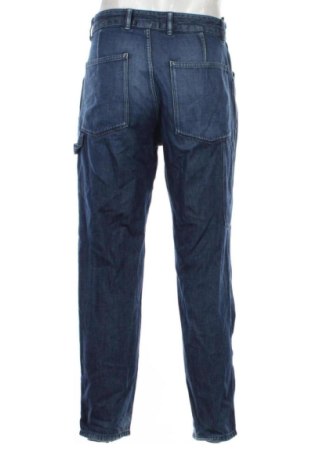 Męskie jeansy Uniqlo, Rozmiar M, Kolor Niebieski, Cena 133,96 zł