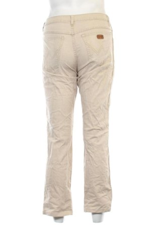 Męskie jeansy Wrangler, Rozmiar S, Kolor Beżowy, Cena 201,99 zł