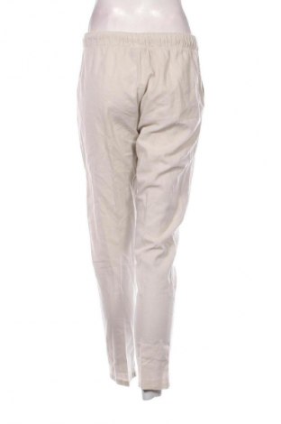 Damskie spodnie Janina, Rozmiar M, Kolor Beżowy, Cena 24,99 zł