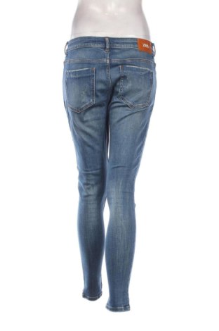 Damskie jeansy Zara, Rozmiar L, Kolor Niebieski, Cena 75,02 zł