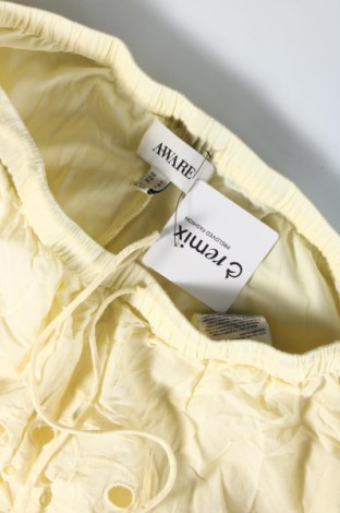 Damskie spodnie Aware by Vero Moda, Rozmiar L, Kolor Żółty, Cena 65,99 zł