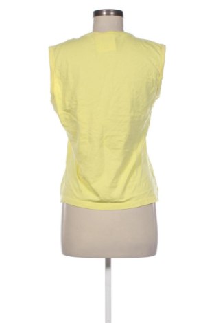 Top sport de damă. PUMA, Mărime L, Culoare Galben, Preț 107,99 Lei
