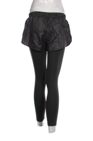 Damskie spodnie sportowe Calzedonia, Rozmiar M, Kolor Czarny, Cena 210,97 zł