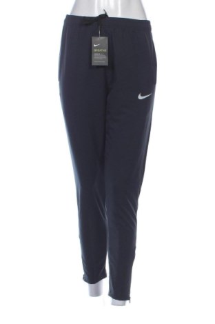 Damskie spodnie sportowe Nike, Rozmiar M, Kolor Niebieski, Cena 257,21 zł