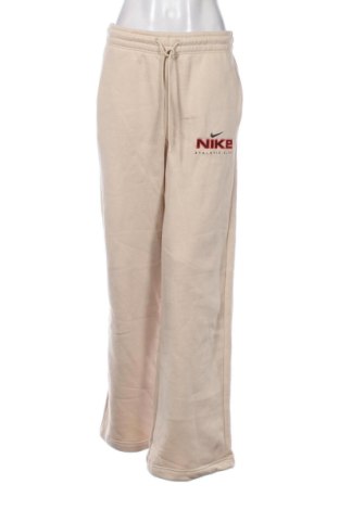 Γυναικείο αθλητικό παντελόνι Nike, Μέγεθος M, Χρώμα  Μπέζ, Τιμή 48,00 €
