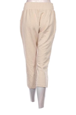 Pantaloni trening de femei Unbranded, Mărime M, Culoare Bej, Preț 91,99 Lei