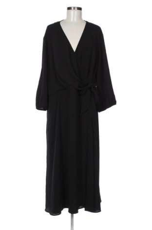 Latzkleid Paprika, Größe L, Farbe Schwarz, Preis 31,99 €