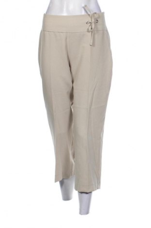 Damskie spodnie Unbranded, Rozmiar M, Kolor Beżowy, Cena 25,99 zł