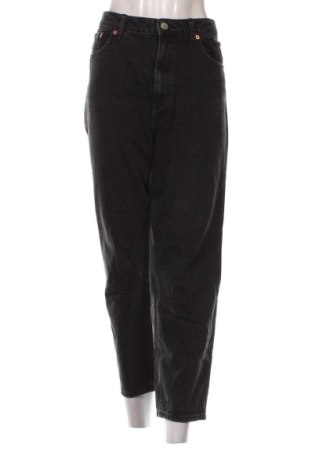 Damskie jeansy Mangoon, Rozmiar XL, Kolor Czarny, Cena 79,40 zł