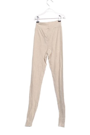 Damskie legginsy Calzedonia, Rozmiar XL, Kolor Beżowy, Cena 72,99 zł