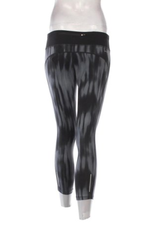 Damskie legginsy Nike, Rozmiar M, Kolor Kolorowy, Cena 91,99 zł