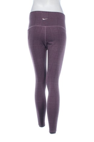 Damskie legginsy Nike, Rozmiar M, Kolor Kolorowy, Cena 91,99 zł