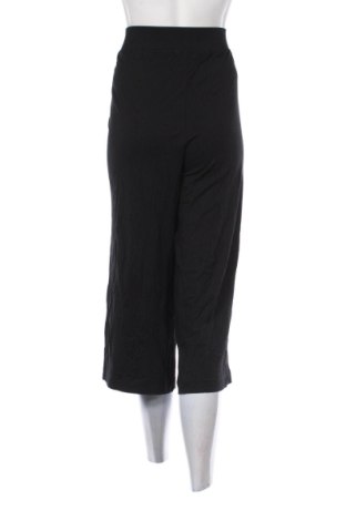 Damskie spodnie TCM, Rozmiar XL, Kolor Czarny, Cena 78,99 zł