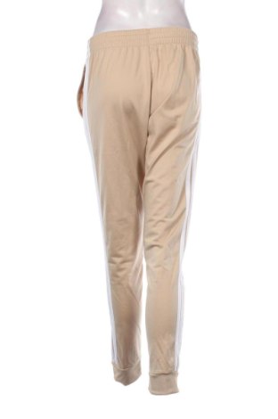 Damskie spodnie sportowe Adidas, Rozmiar S, Kolor Beżowy, Cena 110,99 zł