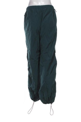 Damskie spodnie sportowe Bershka, Rozmiar M, Kolor Zielony, Cena 78,99 zł