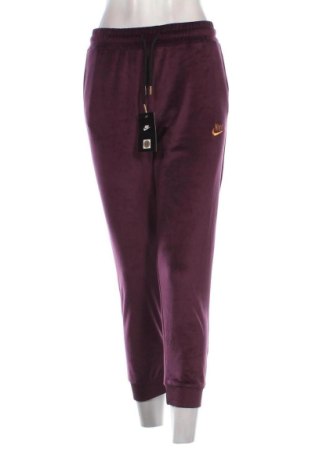 Дамско спортно долнище Nike, Размер M, Цвят Лилав, Цена 35,77 €