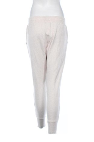 Damskie spodnie sportowe Under Armour, Rozmiar S, Kolor Beżowy, Cena 110,99 zł